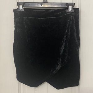 Black velvet mini skirt